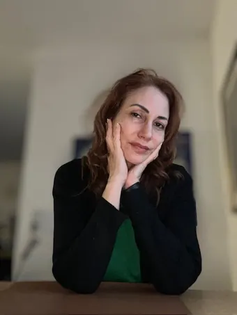 Andrea Kirste, hand on her chin